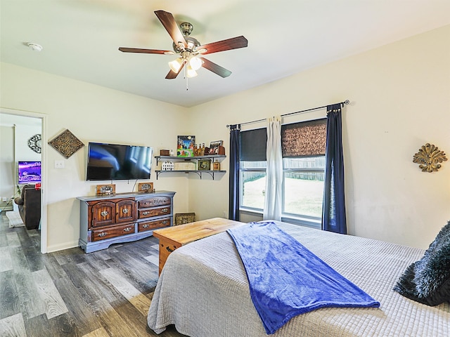 bedroom featuring ceiling fan and hardwood / wood-style flooring