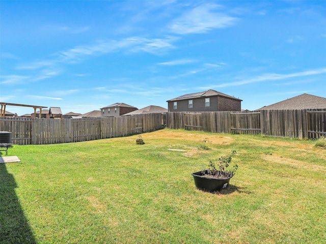 view of yard featuring central AC unit