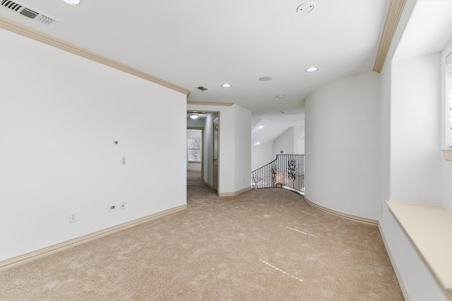 carpeted spare room with baseboards, crown molding, visible vents, and recessed lighting