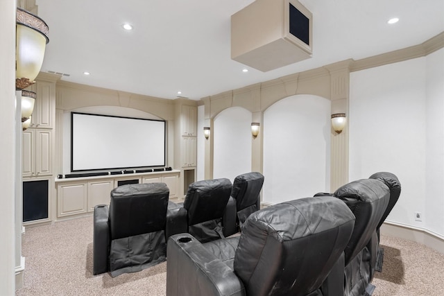 cinema room featuring light carpet, visible vents, crown molding, and recessed lighting