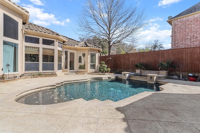 view of swimming pool featuring a fenced backyard, a fenced in pool, and a patio