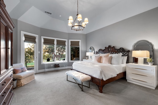 bedroom featuring carpet flooring and an inviting chandelier