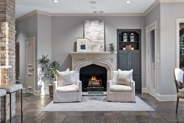 sitting room with crown molding