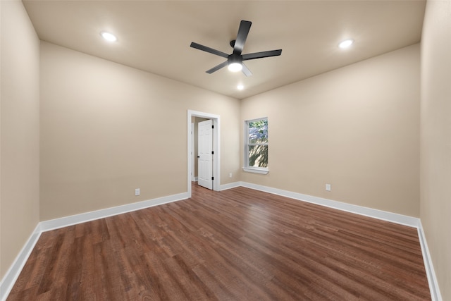 spare room featuring hardwood / wood-style flooring and ceiling fan