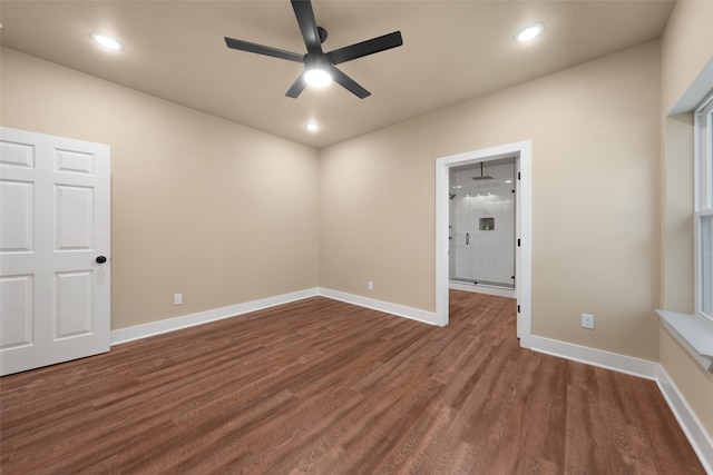 spare room featuring ceiling fan and hardwood / wood-style floors