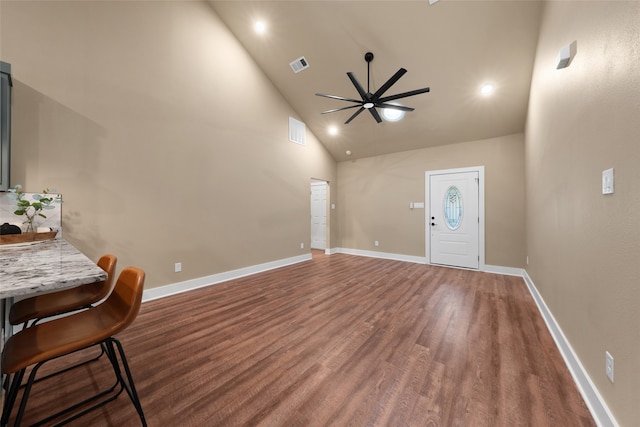 living room featuring high vaulted ceiling, hardwood / wood-style flooring, and ceiling fan