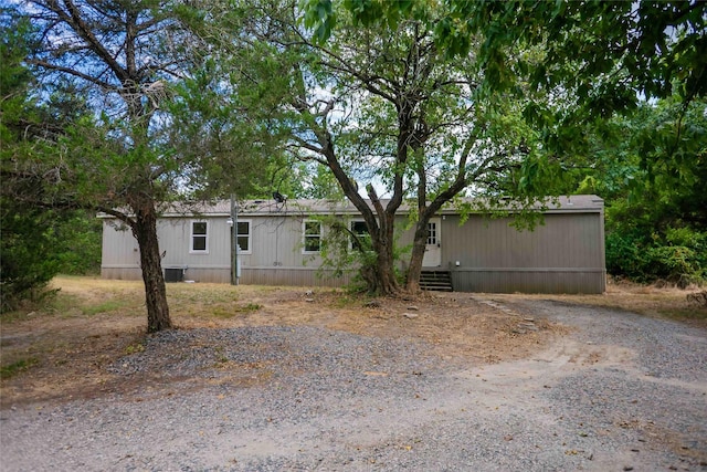 view of front of home with cooling unit
