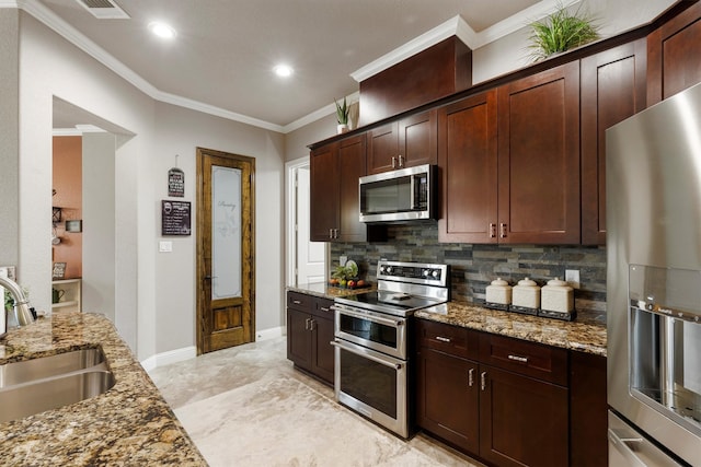 kitchen with light stone countertops, stainless steel appliances, ornamental molding, and sink