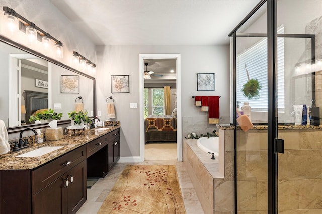 bathroom featuring tile patterned floors, independent shower and bath, ceiling fan, and vanity