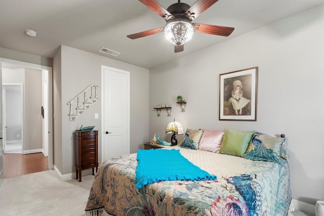 bedroom featuring ceiling fan and carpet floors