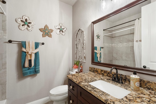 bathroom with vanity, toilet, and a shower with curtain