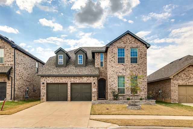 view of front of property featuring a garage