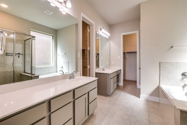 bathroom with vanity, separate shower and tub, and tile patterned floors