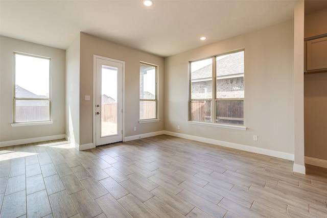 entryway with light hardwood / wood-style flooring