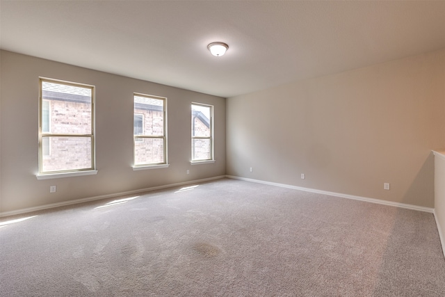 spare room with carpet flooring