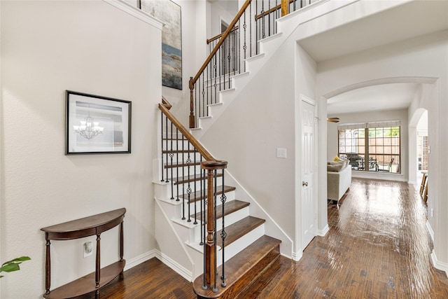 stairway featuring hardwood / wood-style flooring