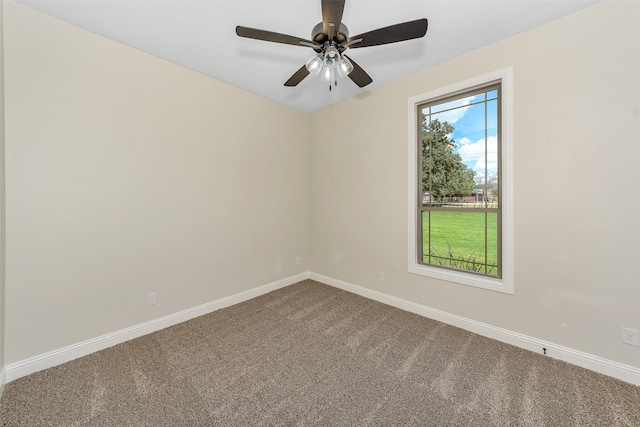 carpeted empty room with ceiling fan