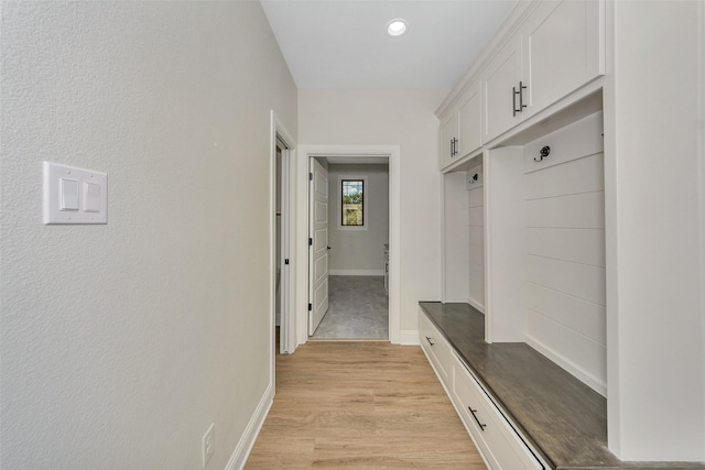 3043 Sunrise Trl, Weatherford, TX 76088 - mudroom with light wood-style floors and baseboards
