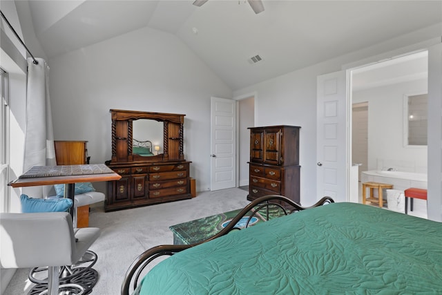 bedroom with visible vents, ensuite bathroom, carpet, ceiling fan, and vaulted ceiling