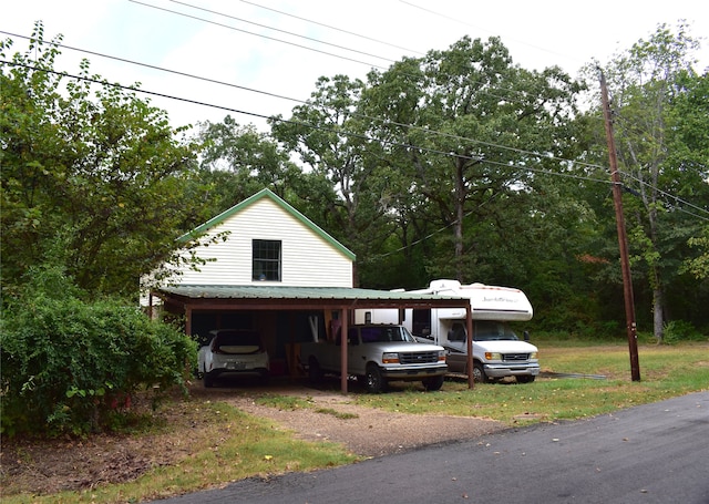 view of front of property with a carport