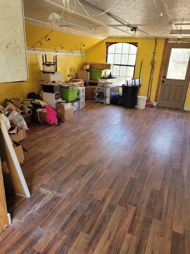 basement featuring dark wood-type flooring