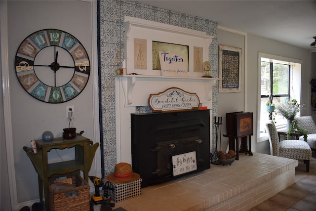 living area featuring a wood stove