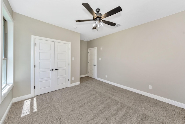 3037 Sunrise Trl, Weatherford, TX 76088 - unfurnished bedroom with a ceiling fan, visible vents, baseboards, a closet, and carpet flooring