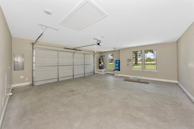 3037 Sunrise Trl, Weatherford, TX 76088 - garage featuring electric panel, a garage door opener, and baseboards