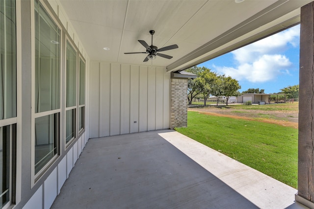 view of patio / terrace featuring ceiling fan