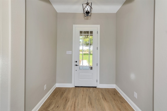 entryway with light hardwood / wood-style flooring