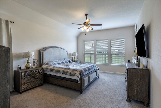 bedroom featuring lofted ceiling, ceiling fan, and carpet floors