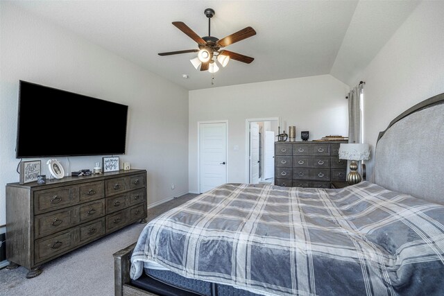 bathroom with lofted ceiling, vanity, and shower with separate bathtub