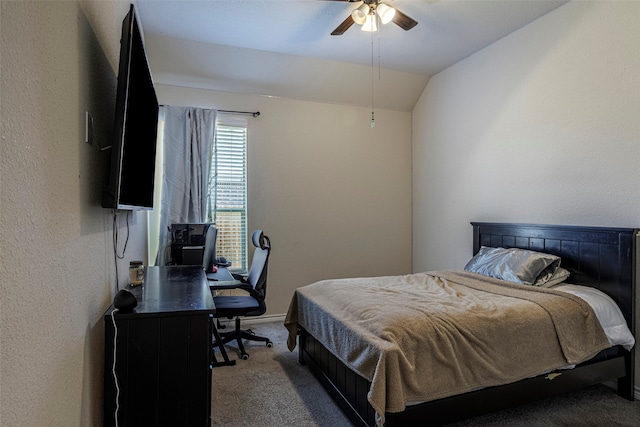 bedroom featuring ceiling fan, carpet, and vaulted ceiling