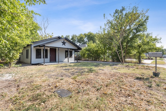 view of yard featuring a porch