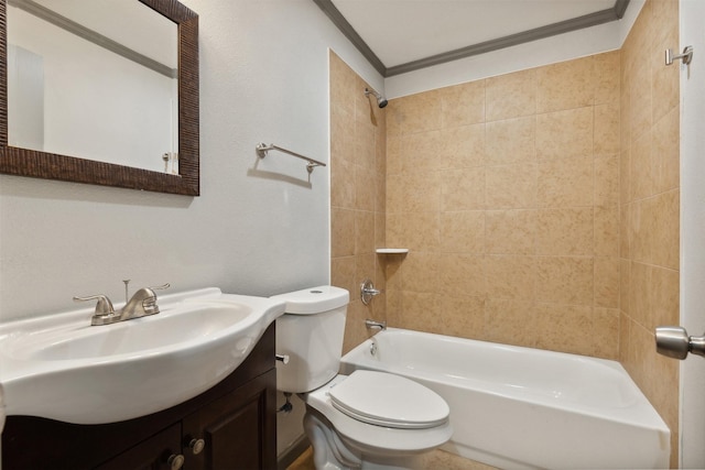 full bath featuring toilet, ornamental molding,  shower combination, and vanity