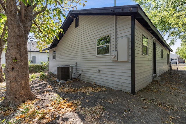 view of home's exterior featuring central AC