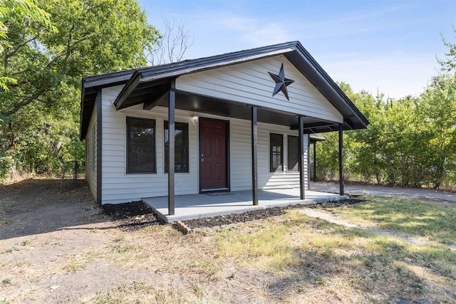 bungalow-style home with a porch