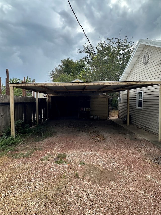 exterior space featuring a carport