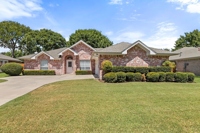 ranch-style house with a front lawn