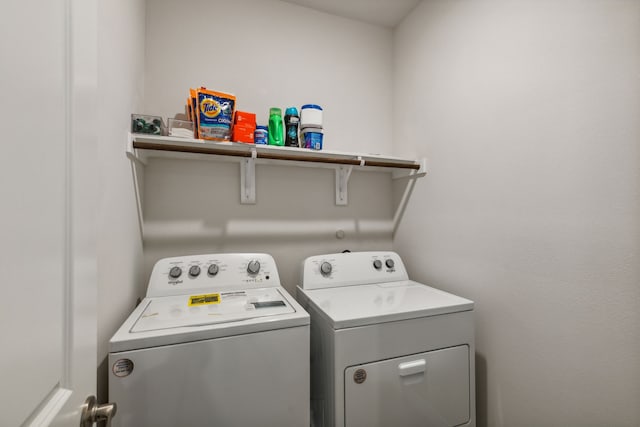 laundry room featuring washing machine and dryer