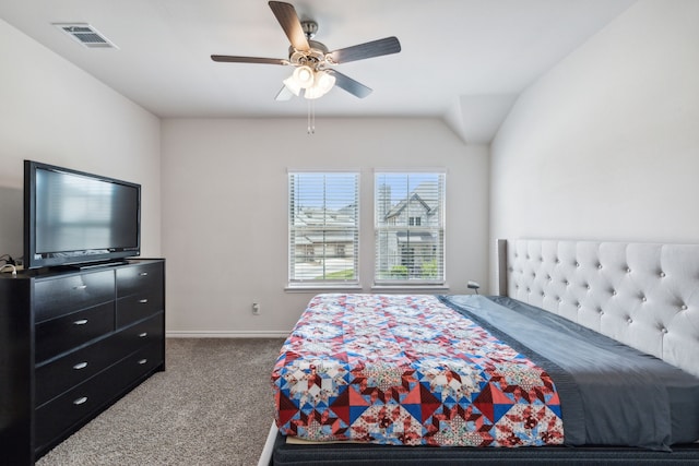 bedroom featuring vaulted ceiling, ceiling fan, and carpet