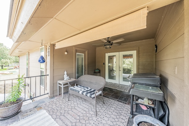 view of patio featuring ceiling fan