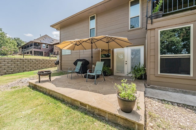 view of patio featuring fence