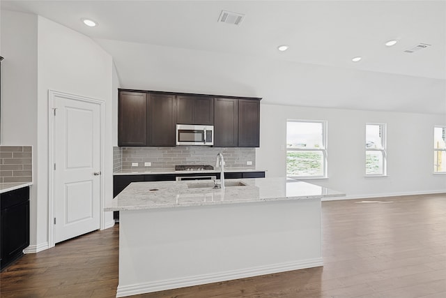 living room featuring hardwood / wood-style floors and ceiling fan