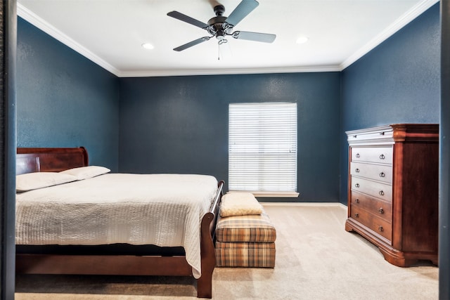 bedroom with ornamental molding, carpet, and ceiling fan