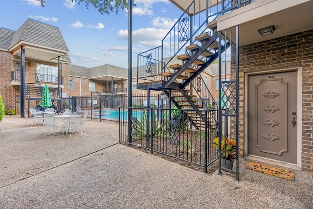 exterior space with a community pool