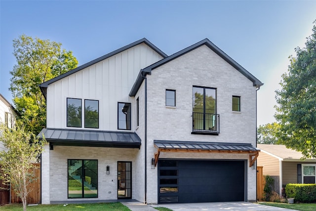 modern farmhouse style home with brick siding, board and batten siding, fence, a garage, and a standing seam roof