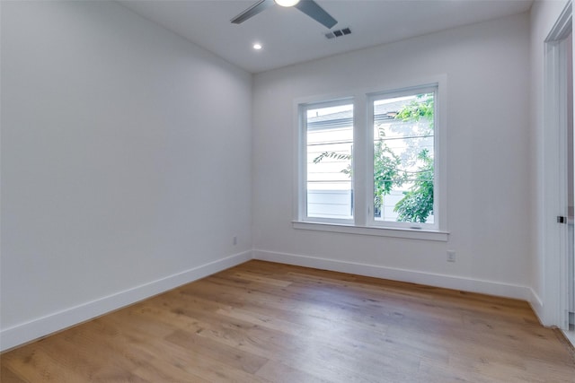 empty room featuring visible vents, ceiling fan, baseboards, recessed lighting, and light wood-style floors