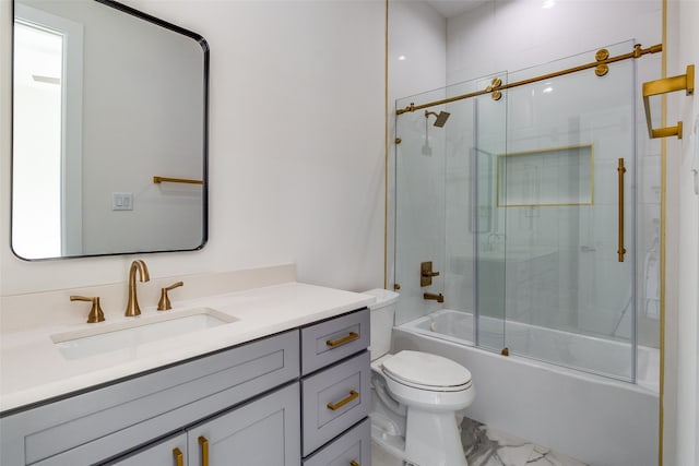 full bathroom with shower / bath combination with glass door, vanity, and toilet