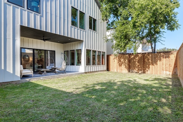 view of yard featuring ceiling fan